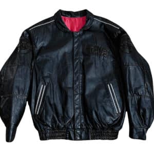 Looney Tunes Taz Wanted Dead or Alive black leather jacket front with TAZ logo on chest and Looney Tunes spell logos on arms