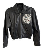 Vintage Michael Hoban Tiger Leather Jacket in black with tiger patch on chest, shirt-style collar, and YKK zipper