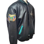 Right side view of Vtg Daytona 1996 Jeff Hamilton Bikers Ball Leather Jacket showing Jeff Hamilton logo patch on the arm.