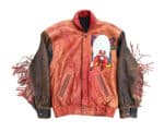 Yosemite Sam leather jacket front, distressed red-brown leather, chest patch, fringed sleeves, snap closure