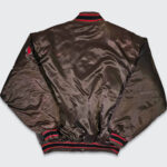 "Back view of Tampa Bay Buccaneers brown satin bomber jacket showing smooth satin finish and classic bomber design"