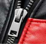 Bomber jacket zipper and leather fabric close up detail