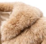 Close up beige fur jacket texture detail