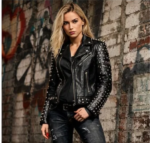 Female model wearing black studded leather jacket urban background
