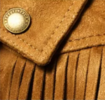 closeup of Fringe Suede Jacket buttons and fringes