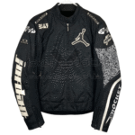 Front of a black Joe Rocket motorcycle jacket with white Jumpman logo, and other racing patches