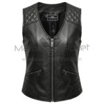 Front view of Black V-Neck Quilted Leather Vest featuring V-neck, central zipper, quilted shoulder and hip panels, and two slanted zip pockets with MAKER OF JACKET label
