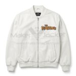 Front view of Flintstones Family Car Ride White Leather Bomber Jacket features yellow and orange embroidered "The Flintstones" logo on the left chest.