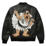 Back view of Fred Flintstone King of Rock Black Leather Bomber Jacket featuring a large graphic of Fred Flintstone dressed as Elvis, holding a microphone and wearing sunglasses.