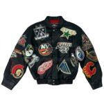 Front view of NHL Premier Edition Multi Patch Black Leather Jacket featuring a vibrant collage of vintage hockey team logo patches across the front and sleeves.