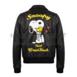 Back view of Snoopy Woodstock Black Bomber Leather Jacket featuring a large graphic of Snoopy hugging Woodstock, framed by yellow script and two red hearts.