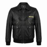 Front view of Snoopy Woodstock Black Bomber Leather Jacket featuring standard collar, utility pockets, ribbed cuffs, and yellow "snoopy" text embroidered on the left chest with Maker Of Jacket brand label.