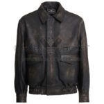 Front view of Distressed Brown The Flintstones Bomber Leather Jacket featuring a shirt-style collar, two large flap pockets, and an elastic hem.