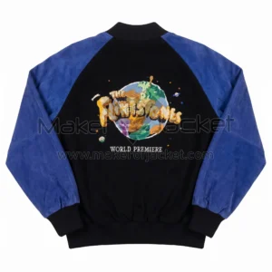 Back view of The Flintstones World Premiere Suede Leather Jacket featuring large globe graphic patch, "The Flintstones" logo, and "WORLD PREMIERE" text.