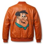 Back view of The Fred Flintstones Orange Leather Bomber Jacket featuring a large leather applique artwork of smiling Fred Flintstone wearing his blue tie.