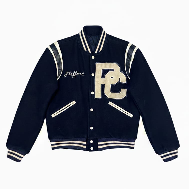 Vintage-Port-Chester-X-Country-Varsity-Jacket-Front Front View Of Vintage Port Chester Varsity Jacket Featuring navy and white wool leather jacket with PC patch and Stafford lettering.