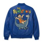 Back view of Fred Flintstone Riding Dino Blue Leather Bomber Jacket featuring Fred Flintstone cartoon artwork dancing beneath the yellow leather applique "YABBA - DABBA DOO!"