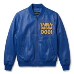 Front view of Fred Flintstone Riding Dino Blue Leather Bomber Jacket features yellow leather applique text "YABBA-DABBA DOO!" on the left ches