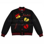 Front View Of Strictly Stacked black varsity jacket Featuring Flirt at Your Own Risk Embroidery and Broken Heart S Patch.