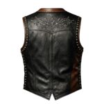 Back View Of Studded Embroidered Leather Vest featuring embroidered design and silver studs.