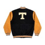 Back View Of Vintage University Of Tennessee Jacket Featuring black and gold featuring a large T logo.