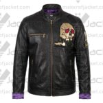Front view of the Metal Hall of Fame Limited Edition 2025 black leather awards jacket featuring an embroidered gold skull emblem and purple satin lining.