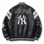 Back View Of New York Yankees Varsity Jacket Featuring NY logo and New York lettering.