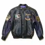 Front View of Yankees 2000 World Series Jacket Featuring distressed navy leather jacket front with championship logos.