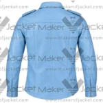 Back View of Long Sleeve Blue Leather Shirt Featuring Short Sleeves Sky Blue Panel Leather Design and Equalets on shoulders.