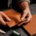 Hands inspecting Nappa leather swatches