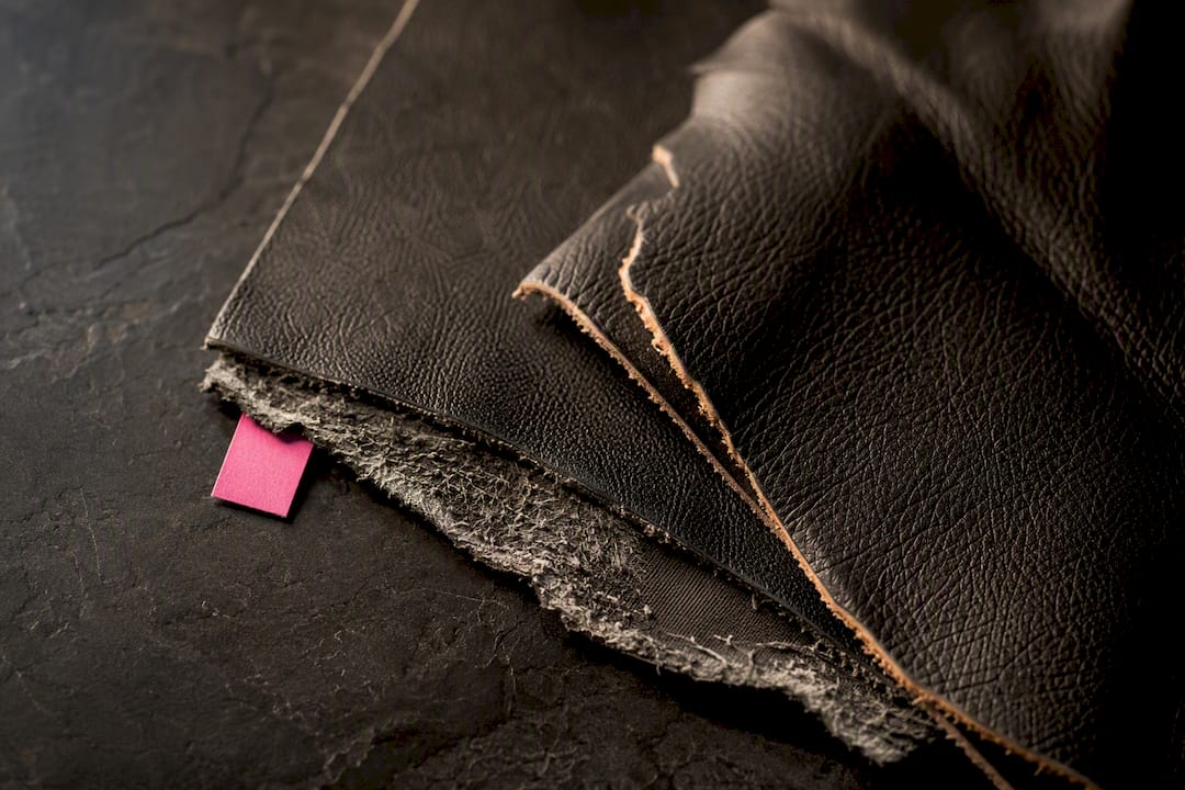 Bonded and genuine leather material edges